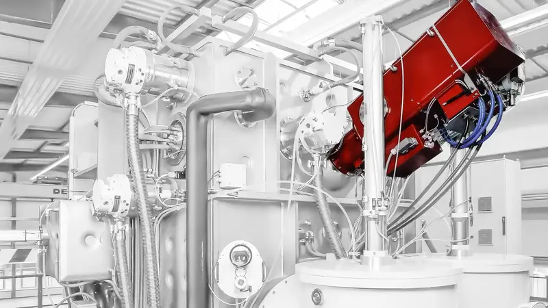 Perspective view of a VON ARDENNE roll-to-roll vacuum coating line for flexible substrates.