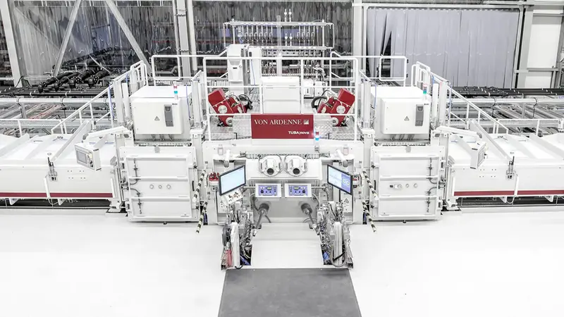 Perspective view of a VON ARDENNE turbine blade coating line.