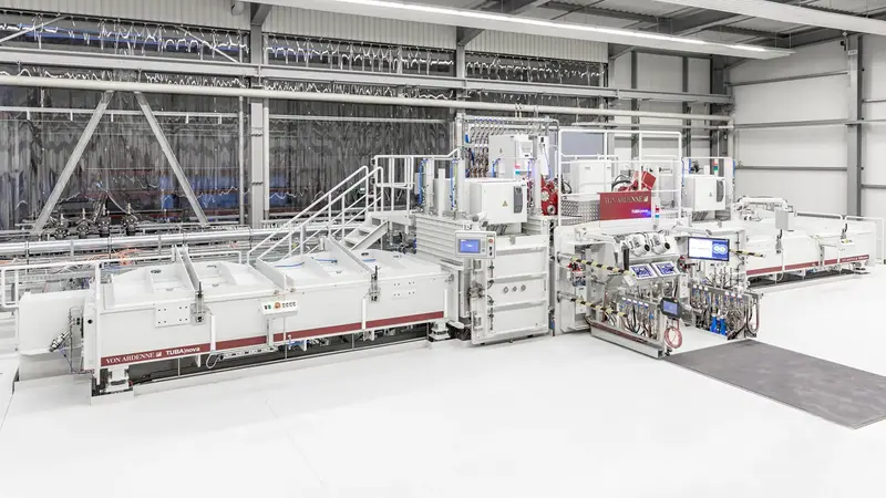 Perspective view of a VON ARDENNE turbine blade coating line.