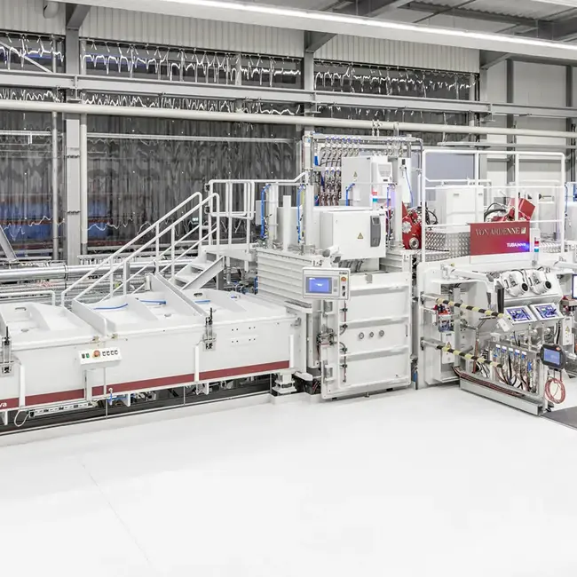 Perspective view of a VON ARDENNE turbine blade coating line.